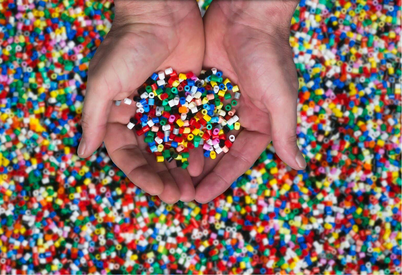 Plastic Granules in Hand
